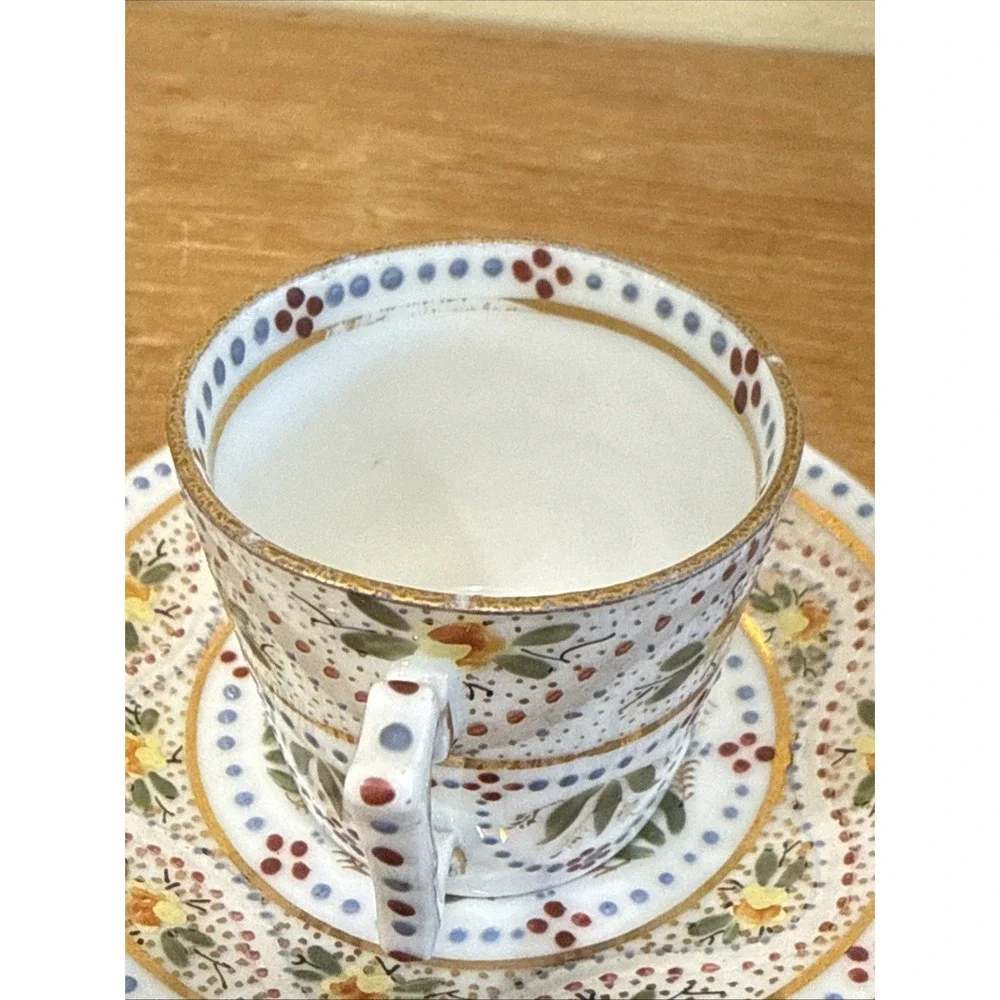 Antique Austrian demitasse cup and saucer hand painted floral gold trim